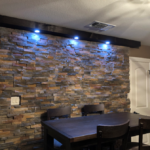Stone veneer wall in dining room in texas